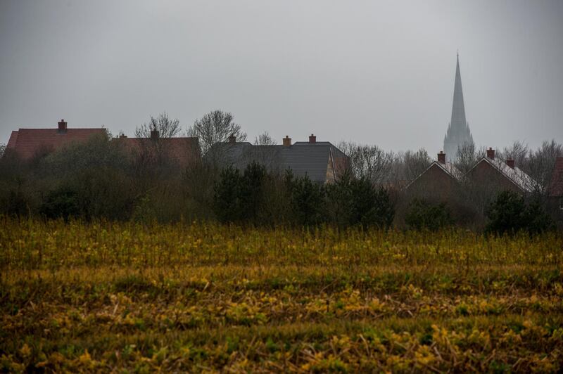 SALISBURY, ENGLAND - APRIL 10:  The spire of Salisbury Cathedral is seen in the distance whilst investigations continue into the nerve agent attack on Sergei and Yulia Skripal on April 10, 2018 in Salisbury, England. Russian ex-spy Sergei Skripal and his daughter Yulia Skripal were attacked with nerve agent Novichok in Salisbury on March 4, 2018 and have since been under the care of Salisbury District Hospital. Yulia Skripal has now been discharged from the hospital and taken to a secure location while her father remains at the hospital but no longer in a critical condition.  (Photo by Chris J Ratcliffe/Getty Images)