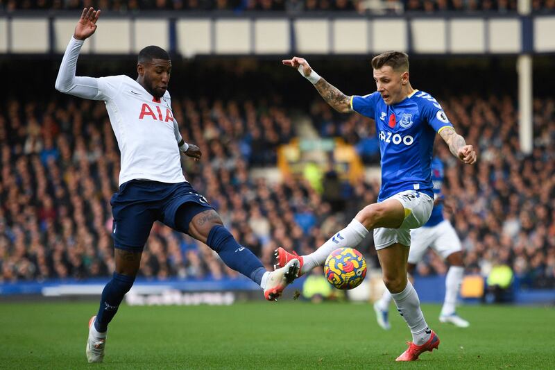 Everton defender Lucas Digne and Tottenham defender Emerson Royal challenge foe the ball. AFP