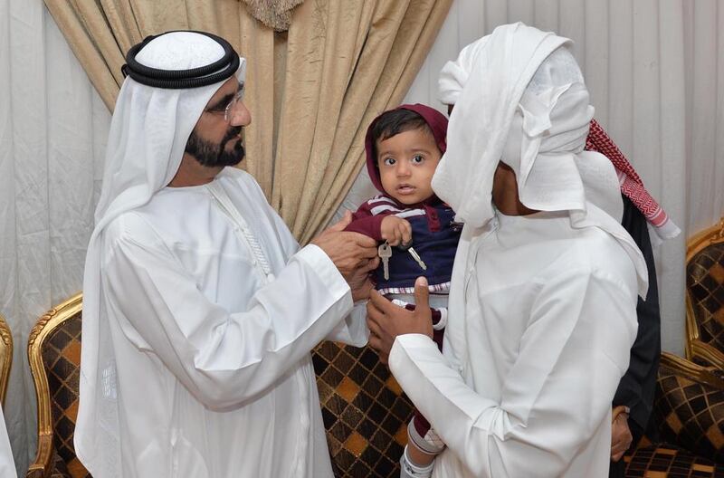 Sheikh Mohammed meets and offers condolences to the families of the two pilots. WAM