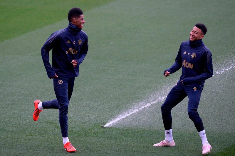 United's Jesse Lingard, left, and Marcus Rashford enjoy a lighter moment in training. AFP