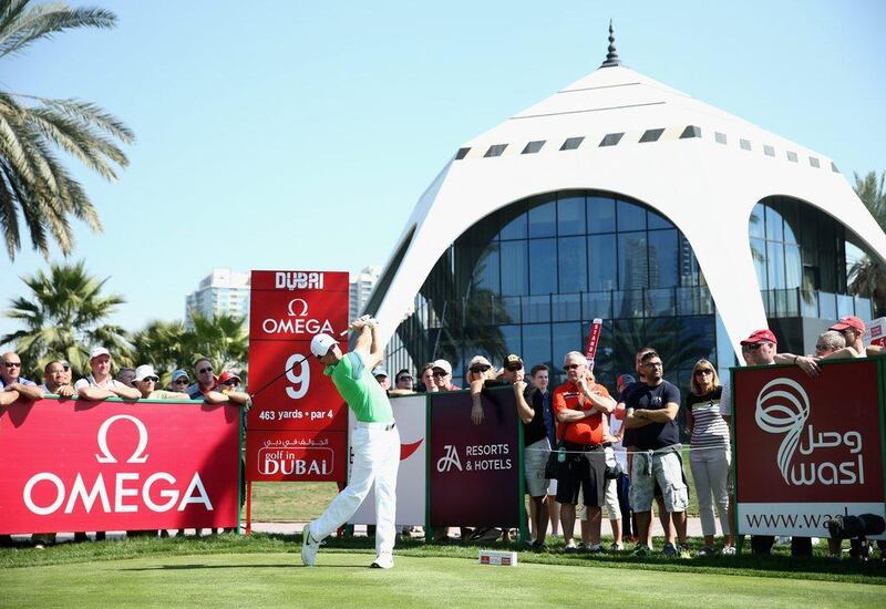 Rory McIlroy tees off on the ninth hole during the first round of the Omega Dubai Desert Classic at the Emirates Golf Club. Warren Little / Getty