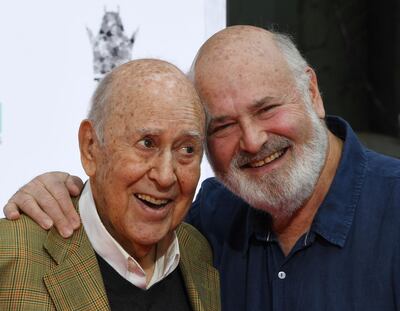 (FILES) In this file photo taken on April 07, 2017 Carl Reiner (L) and Rob Reiner are honored with a hand and footprint ceremony at the TCL Chinese Theatre IMAX in Hollywood, California on April 7, 2017.  Carl Reiner, a revered and versatile comedy entertainer who won nine Emmies and stayed active into the 1990s with roles in movies such as the "Ocean's Eleven" franchise, has died at the age of 98. Showbiz friends of the writer, actor, director and producer confirmed his death, which news reports said came the night of June 30, 2020 of natural causes at his home in Beverly Hills.
 / AFP / Mark RALSTON
