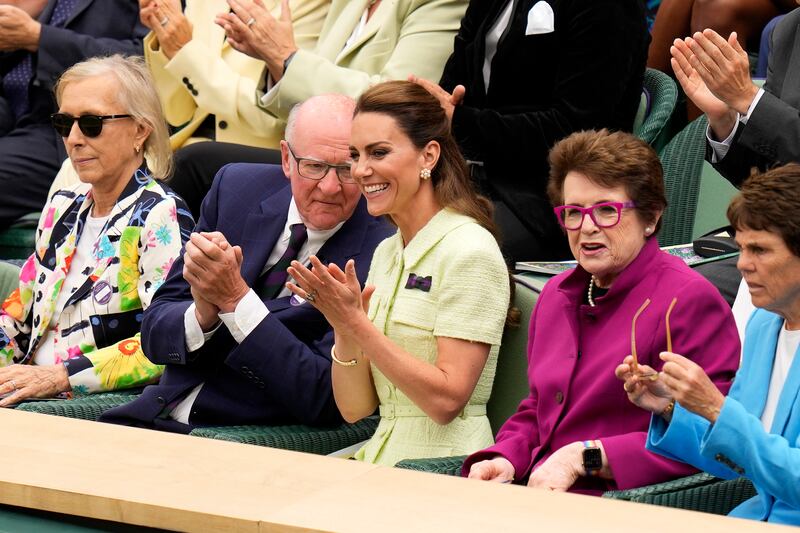 The Princess of Wales, centre, sits in the royal box with tennis legends Billie Jean King, second right, Martina Navratilova and AELTC chairman Ian Hewitt. AP