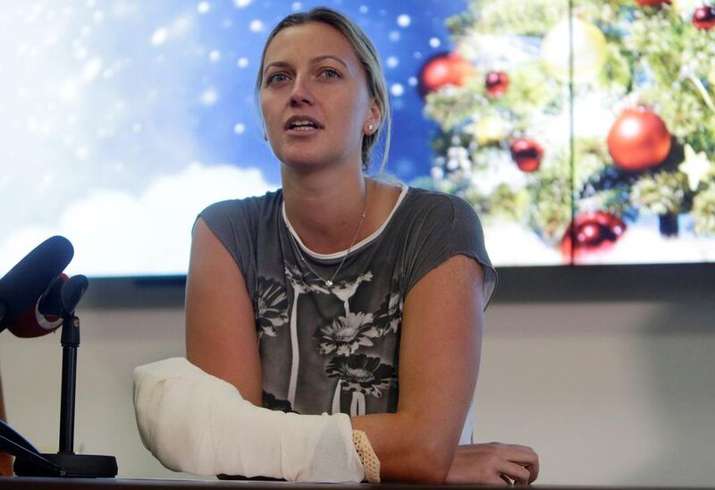 Petra Kvitova addresses the media in December after surgery on her hand following the knife attack. David W Cerny / Reuters