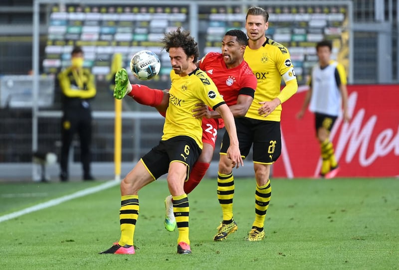 Bayern Munich's Serge Gnabry in action with Borussia Dortmund's Thomas Delaney. Reuters