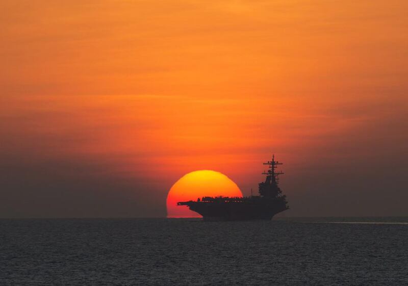 File photo released by the US navy in 2014, showing the aircraft carrier USS George HW Bush transiting the Gulf of Aden, as seen from the guided-missile cruiser USS Philippine Sea on the Persian Gulf. US Navy, Abe McNatt/AP Photo