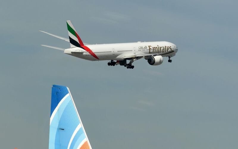 An Emirates aircraft takes off from Dubai International Airport.