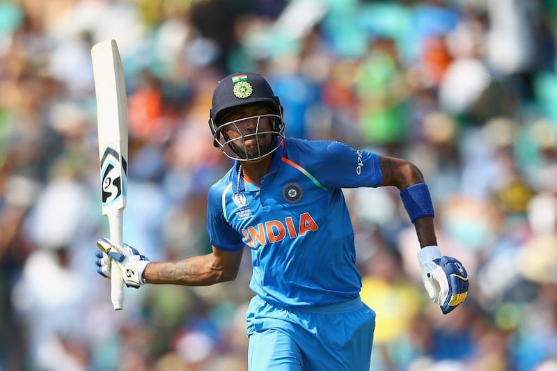 Hardik Pandya of India swings his bat in frustration after being run out. Getty
