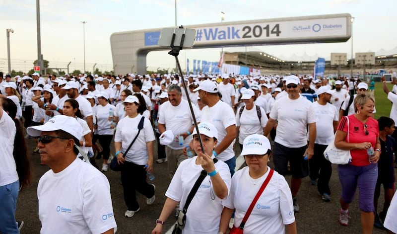 Walkers take part in the Imperial College London Diabetes Centre’s Walk 2014, at Yas Marina Circuit. Irene Garcia Leon for The National 