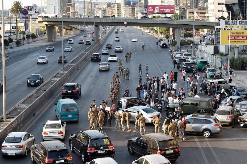 Protesters block a motorway in north Beirut, Lebanon, where state-provided electricity has reached record-low levels. EPA
