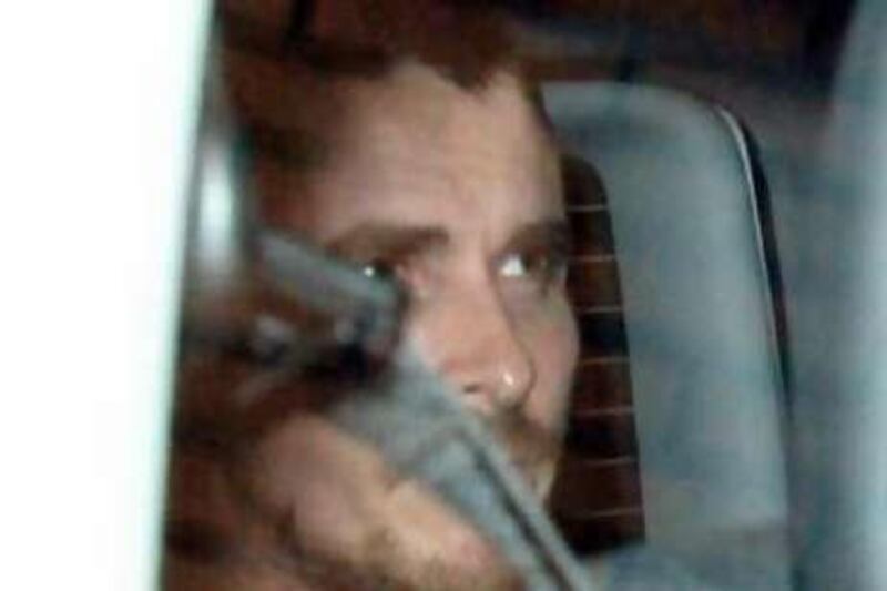 Christian Bale leaves Belgravia Police Station in central London. Mr Bale was arrested and questioned by police over allegations of assault, police said.