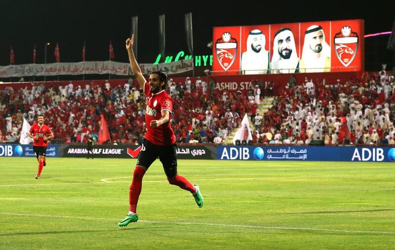 Humaid Abdulla Abbas of Al Ahli celebrates scoring the opening goal against Al Dhafra on Sunday. Warren Little / Getty Images 