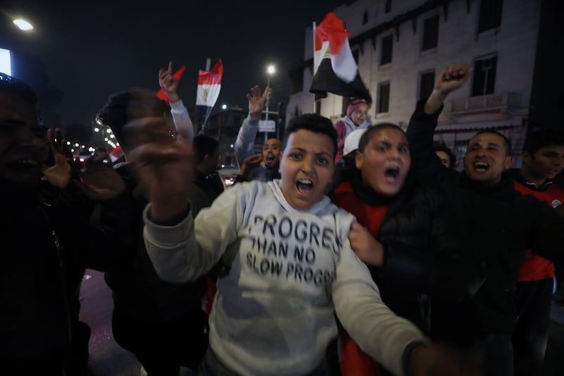 Egypt fans celebrate in Cairo after their team's Afcon semi-final win over Cameroon. All photos: EPA