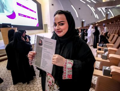 Mariam Al Marri, who seeking a job in public relations, visits the career fair at the Abu Dhabi Energy Centre. Victor Besa / The National