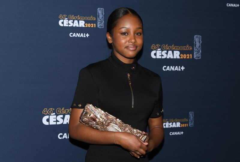 Actress Fathia Youssouf poses during a photocall after receiving the Best Female Newcomer Award for her role in the film "Mignonnes" (Cuties) during the 46th Cesar Awards ceremony at the Olympia concert hall  in Paris, France, March 12, 2021. Pascal Le Segretain/Pool via REUTERS