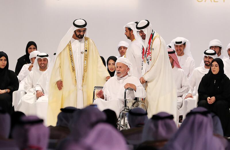 ABU DHABI , UNITED ARAB EMIRATES , NOV 28  – 2017 :- Sheikh Mohammed Bin Rashid Al Maktoum ,  Vice President and Prime Minister of the UAE , and ruler of the Dubai ( left ) and Sheikh Mohammed Bin Zayed Al Nahyan , Crown Prince of Abu Dhabi and Deputy Supreme Commander of the UAE Armed Forces ( right ) giving awards to Saif Al Mansoori ( 105 years old ) from Abu Dhabi  during the UAE Pioneers awards ceremony held at St Regis hotel on Saadiyat island in Abu Dhabi.  (Pawan Singh / The National) Story by Shareena