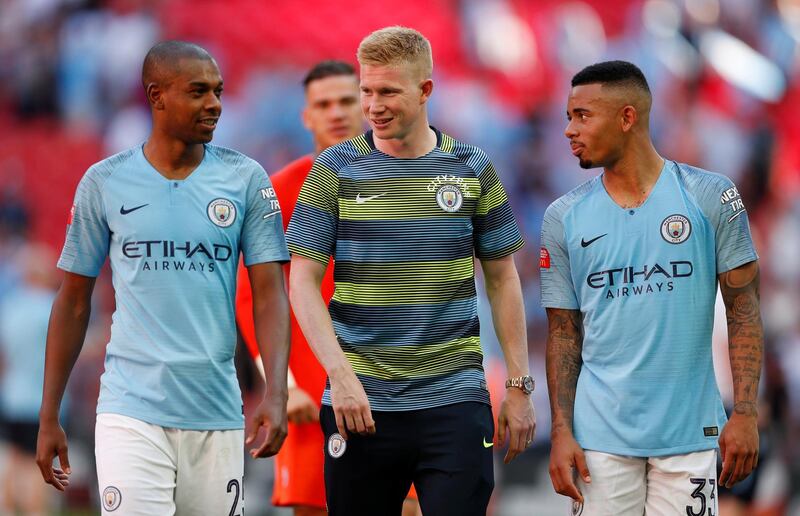 Soccer Football - FA Community Shield - Manchester City v Chelsea - Wembley Stadium, London, Britain - August 5, 2018  Manchester CityÕs Fernandinho, Kevin De Bruyne and Gabriel Jesus celebrate winning the community shield after the match  Action Images via Reuters/John Sibley