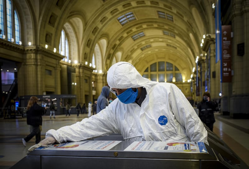 A worker disinfects at Constitucion Train Station during government-ordered coronavirus lockdown in Buenos Aires, Argentina. Getty Images