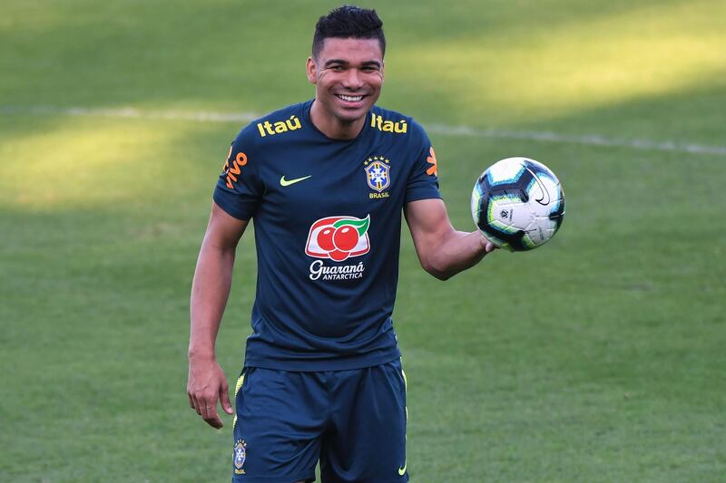 Casemiro sees the funny side of training. AFP