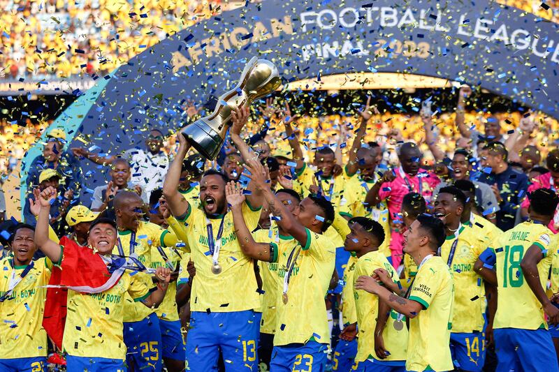Mamelodi Sundowns players celebrate after winning the African Football League final against Wydad Casablanca at Loftus Versveld in Pretoria on November 12, 2023.  AFP