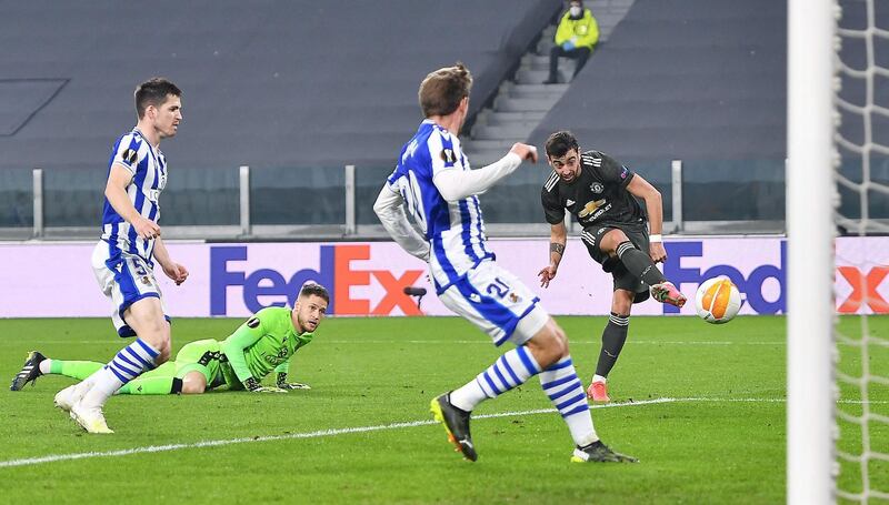 Manchester United's Bruno Fernandes scores the opening goal against Real Sociedad at the Allianz Stadium in Turin. EPA