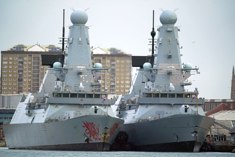Two of the Royal Navy's Type 45 destroyers, 'HMS Dragon', left, and 'HMS Duncan', in Portsmouth Harbour, on  February 7, 2022. PA