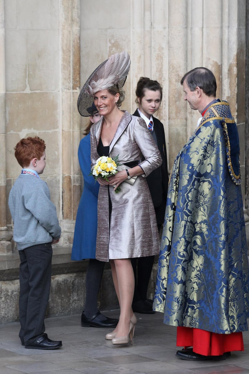 LONDON, ENGLAND - MARCH 12:  Sophie, Countess of Wessex (C) leaves Westminster Abbey after attending the annual Commonwealth Day Observance Service on March 12, 2012 in London, England. The theme for this year's Observance Service, attended by representatives from the Commonwealth countries is â€˜Connecting Cultures'. Her Majesty Queen Elizabeth II will conduct a Diamond Jubilee tour of the UK between March 8, 2012 and July 25, 2012.  (Photo by Oli Scarff/Getty Images)