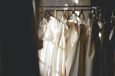 As hard as it is, avoid the urge to try on your dress too often so as not to stain it. Unsplash