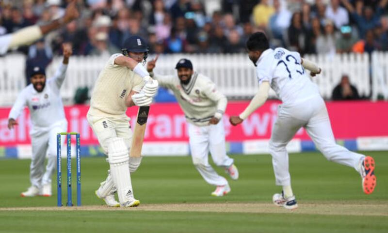 Mohammed Siraj celebrates dismissing England batsman Sam Curran.