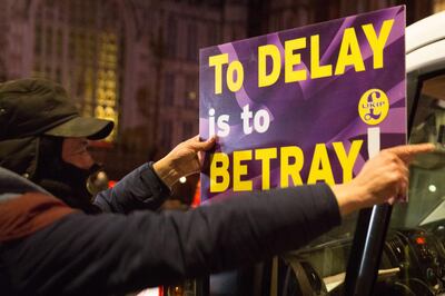 LONDON, ENGLAND - MARCH 12: Protesters from the leave Brexit camps demonstrate on College Green  on March 12, 2019 in London, England. MPs will begin voting on Theresa May's Brexit deal this evening at 7pm. The Prime Minister has consistently said hers is the only deal that Brussels will entertain and has urged support from Parliament to avoid the UK crashing out of the European Union with no deal. (Photo by Georgia O'Callaghan/Getty Images)