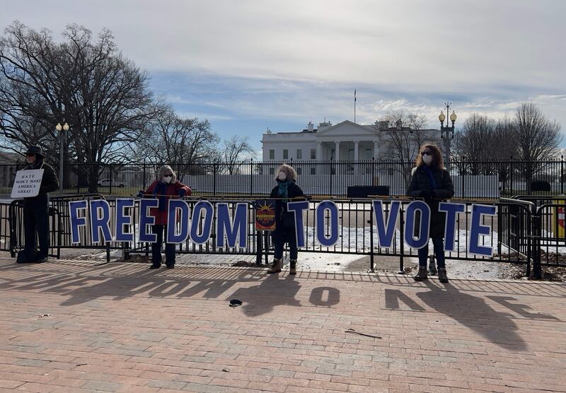 Activists demonstrate for voting rights outside the White House in Washington as the Senate prepares to vote. AFP