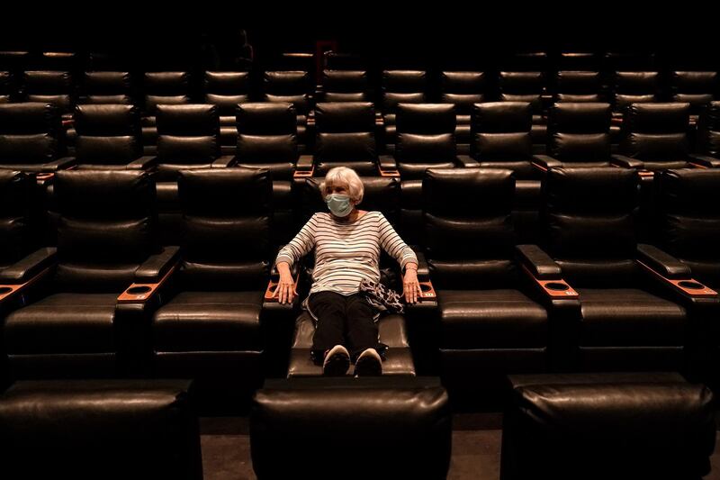 Karen Speros, 82, waits for a movie to start at a Regal movie theater in Irvine, California, US. AP Photo