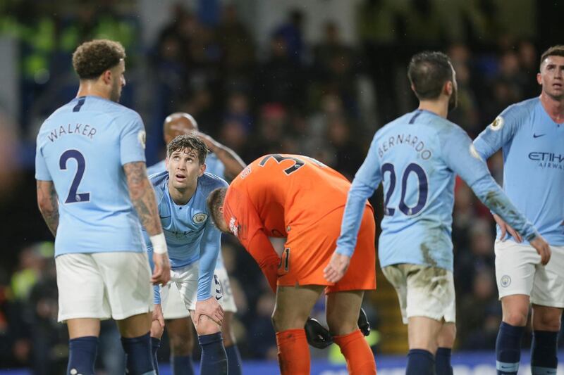 Manchester City players after the defeat to Chelsea at Stamford Bridge. AP Photo