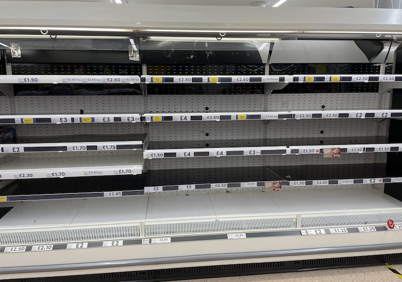 Empty shelves in the meat aisle of a Tesco supermarket in Liverpool. A shortage of lorry drivers in the UK has particularly affected the food and drink supply chain. Photo: PA