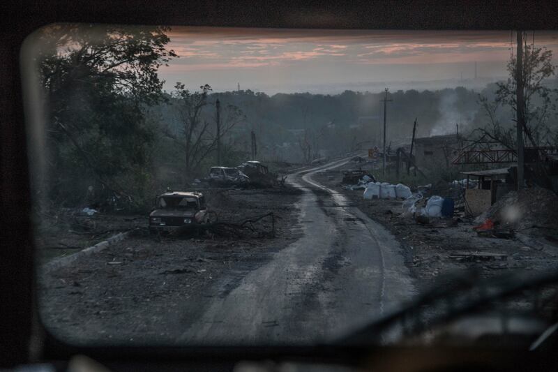 The gutted remains of cars lie along a road during heavy fighting at the front line in Severodonetsk, Luhansk region, Ukraine. AP Photo