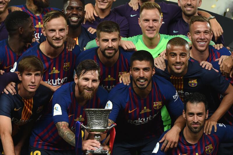 Barcelona celebrate their win in the Spanish Super Cup. AFP