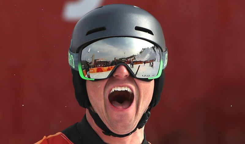 Nevin Galmarini of Switzerland celebrates his win in the men's snowboard parallel giant slalom finals at the PyeongChang 2018 Olympic Games, South Korea. Farzy Ismail / EPA