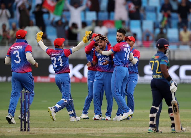 Afghanistan's Fazalhaq Farooqi took three wickets in Dubai.  Chris Whiteoak / The National