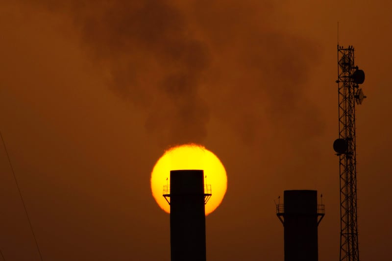 A power plant smokestack in Basra. Iraq, the second-largest oil producer within Opec, has room to grow output substantially. AFP