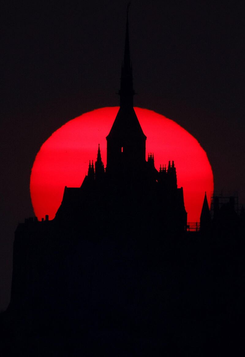 The iconic Mont Saint-Michel, in Normandy, France, photographed at sunset during a nationwide curfew as part of measures against Covid-19. Reuters