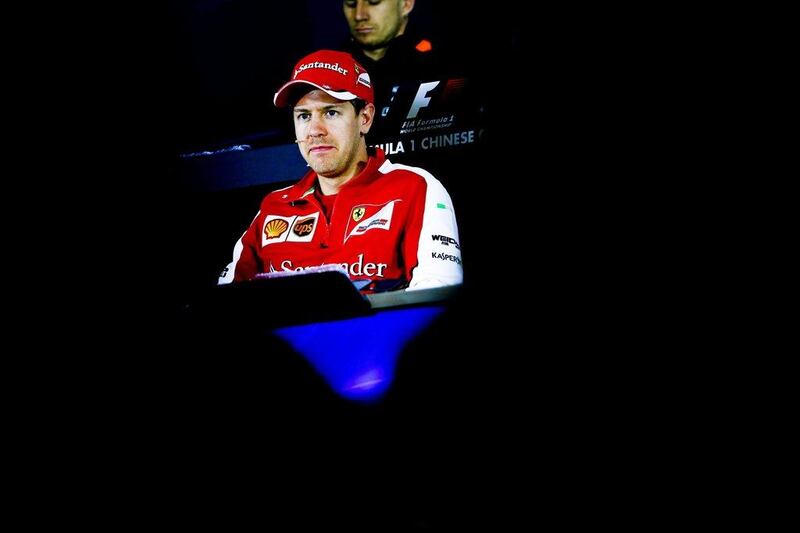 Ferrari driver Sebastian Vettel shown during Thursday's press conference in Shanghai for Sunday's Chinese Grand Prix. Diego Azubel / EPA / April 9, 2015