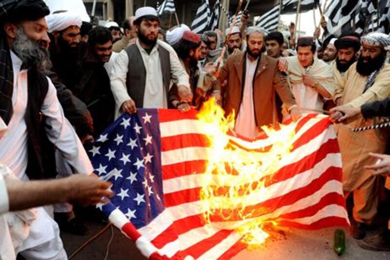 Protesters burn a US flag in Quetta, in the Pakistani province of Balochistan, after Siddiqui’s conviction by a New York court.