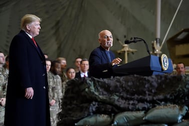 Afghan President Ashraf Ghani speaks to US soldiers at Bagram air base during a surprise Thanksgiving Day visit by President Donald Trump on November 28, 2019. AFP