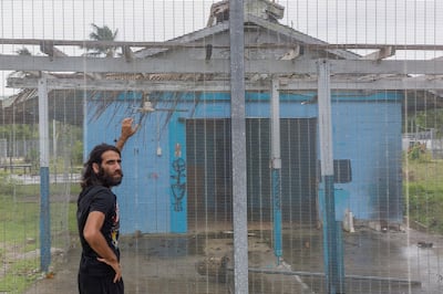 MANUS ISLAND, PAPUA NEW GUINEA - 2018/02/06: Asylum seeker Behrouz Boochani, stands outside the  abandoned naval base on Manus island, where he and other asylum seekers were locked up for the first three years.

The human cost of Australias offshore detention policy has been high for those unfortunate enough to have been caught in its net. For asylum seekers trapped on the remote island of Manus in Papua New Guinea, the future remains as uncertain as ever. Australias offshore detention center there was destroyed in 31 October 2017 but for the 600 or so migrants who remain on the remote Pacific island, little has changed. The asylum seekers live with the torment of separation from family and friends and in the shadow of depression and the traumas of their past. (Photo by Jonas Gratzer/LightRocket via Getty Images)