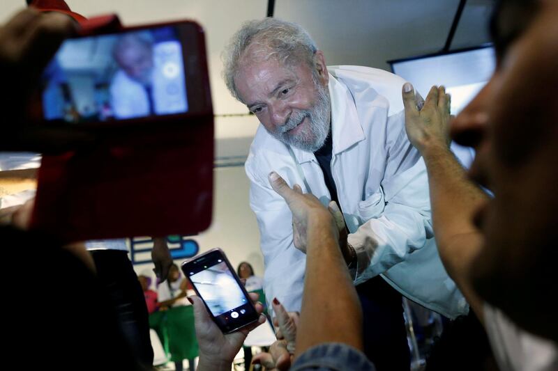 Brazil's former President Luiz Inacio Lula da Silva attends a rally at the National Congress of Garbage Collectors in Brasilia, Brazil December 13, 2017. REUTERS/Adriano Machado