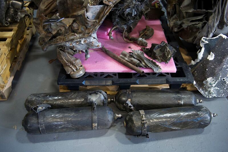 The remains of an Iranian rocket which was fired by Yemen into Saudi Arabia, according to U.S. Ambassador to the U.N. Nikki Haley during a press briefing at Joint Base Anacostia-Bolling Thursday, Dec. 14, 2017, in Washington. Haley says "undeniable" evidence proves Iran is violating international law by funneling missiles to Houthi rebels in Yemen. Nikki Haley unveiled recently declassified evidence including segments of missiles launched at Saudi Arabia from Houthi-controlled territory in Yemen.  (AP Photo/Cliff Owen)