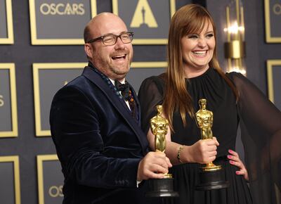Patrice Vermette and Zsuzsanna Sipos pose with their Oscars for 'Dune'. Reuters