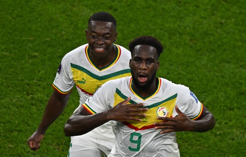Senegal's Boulaye Dia celebrates with teammate Nampalys Mendy after scoring. AFP
