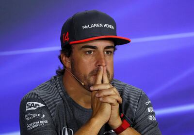 McLaren F1 driver Fernando Alonso attends a news conference ahead of the Singapore F1 Grand Prix night race in Singapore September 14, 2017. REUTERS/Edgar Su