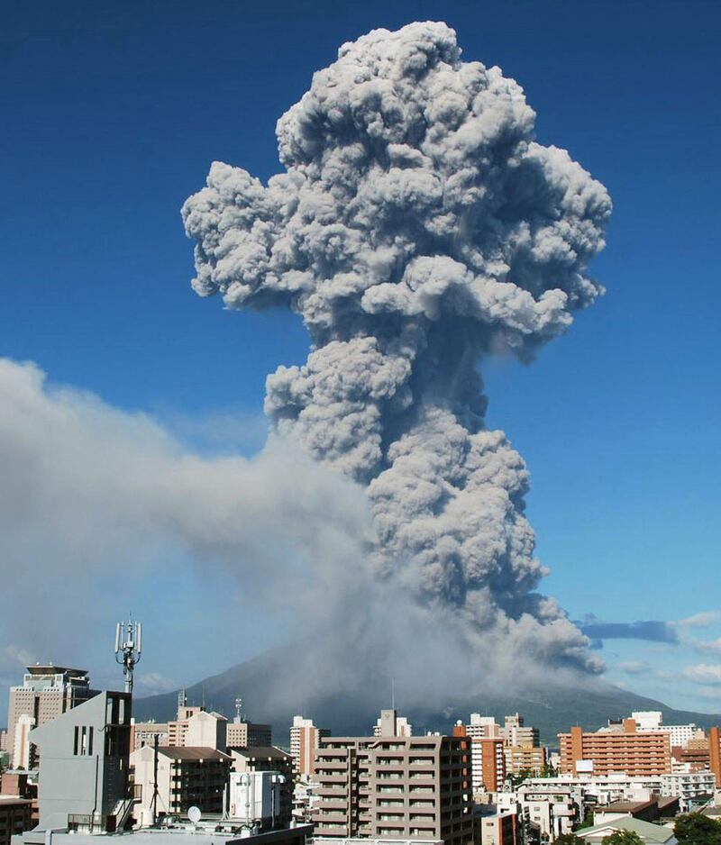 In this photo released by Kagoshima Local Meteorological Observatory, volcanic smoke billows from Mount Sakurajima in Kagoshima, on the southern Japanese main island of Kyushu Sunday, Aug. 18, 2013. Kyodo reported that it erupted Sunday evening, marking the 500th eruption this year at the 1,117 meters (3,686 foot) high mountain, which is one of Japan's most active volcanoes. There is no immediate reports of injuries.  (AP Photo/Kagoshima Local Meteorological Observatory) CREDIT MANDATORY *** Local Caption ***  Japan Eruption.JPEG-01aaa.jpg
